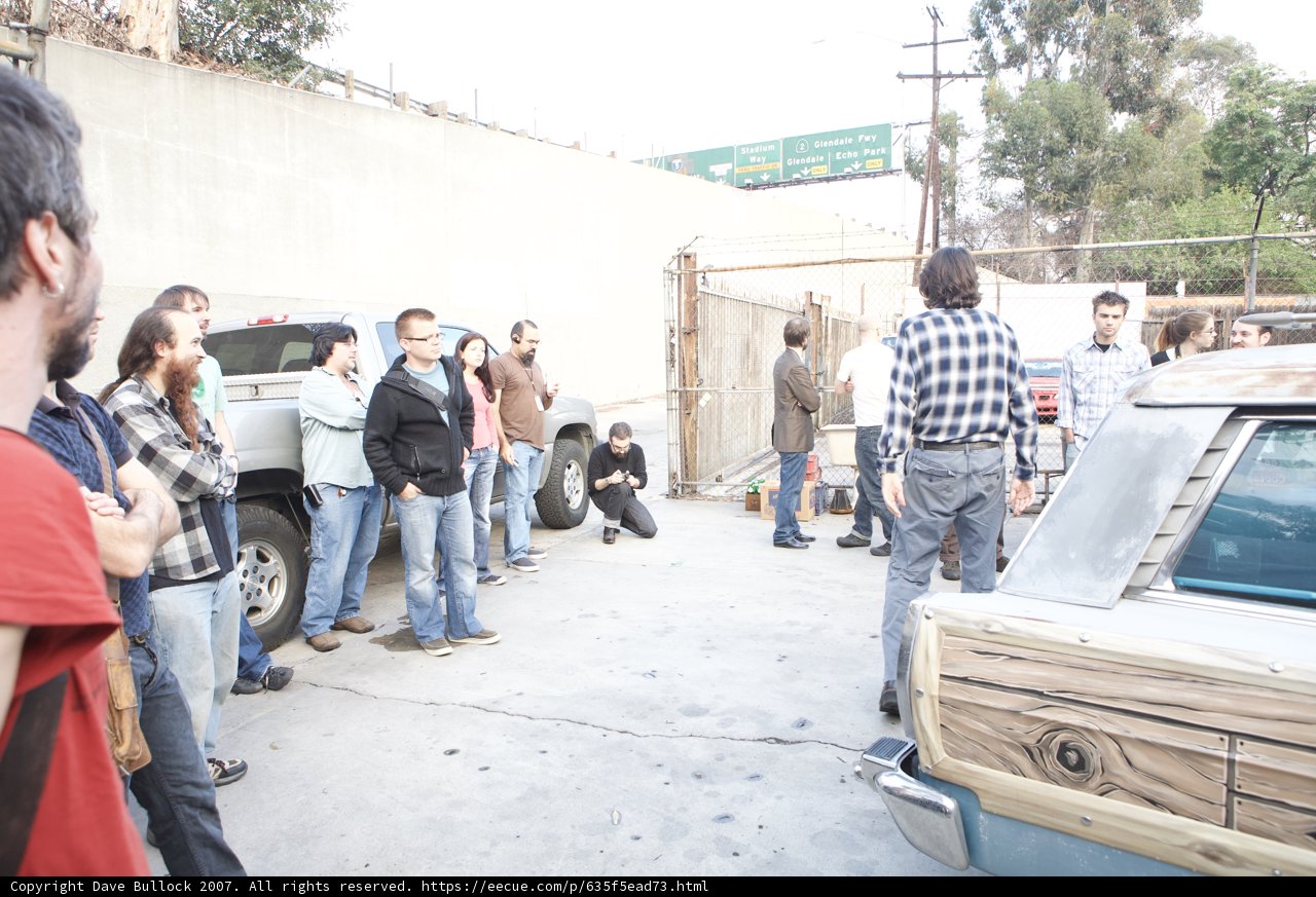 Group of Friends Checking Out a Car