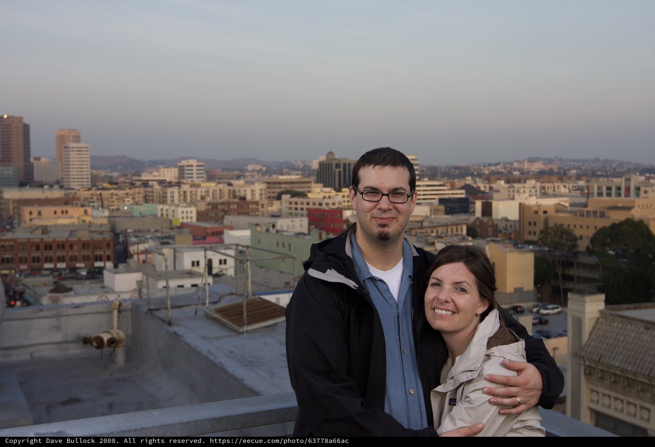 Couple Embracing on Downtown Los Angeles Rooftop