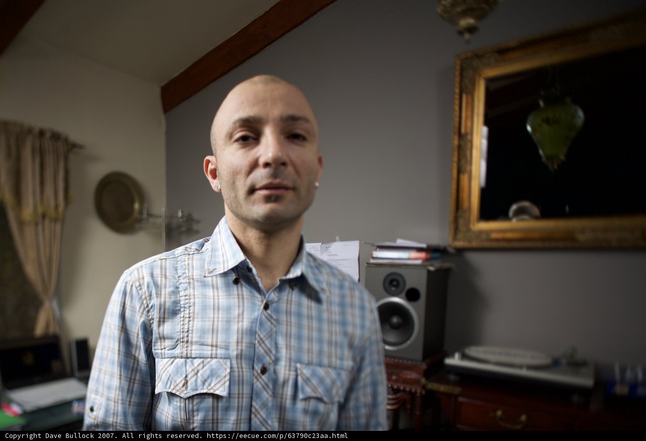 Bald Man Admiring His Music Art Piece