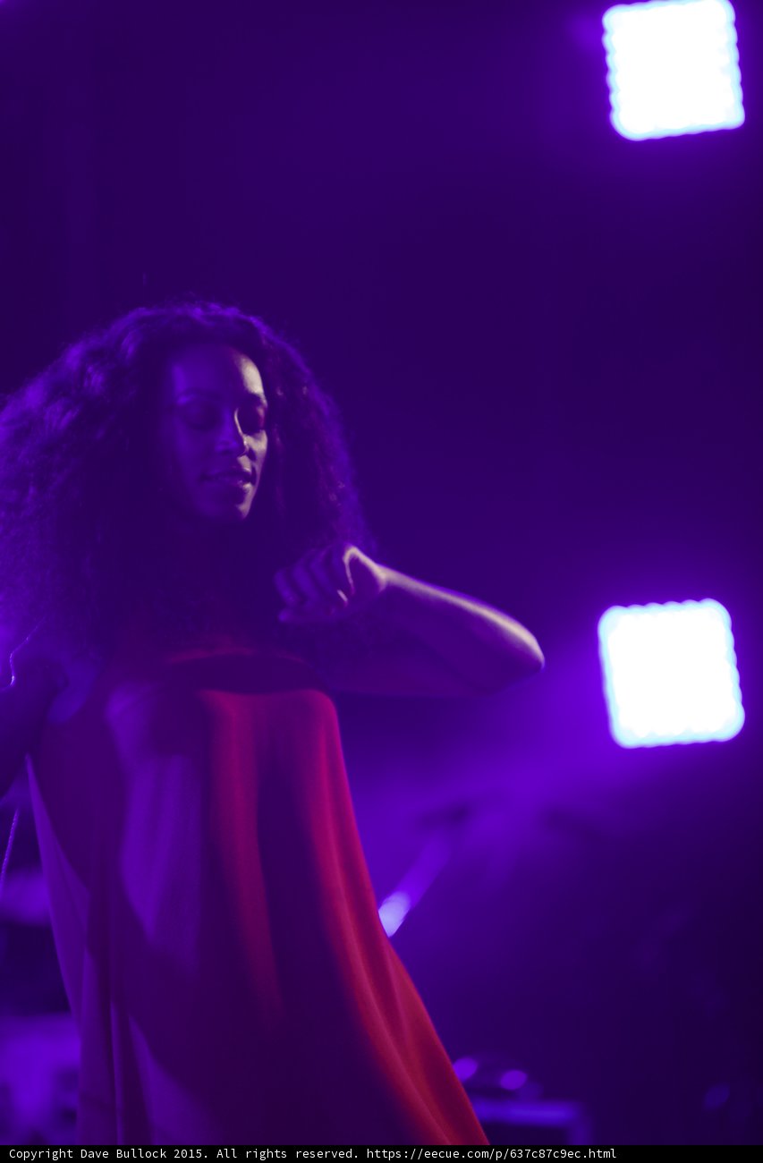 Solange Eyes Closed Hand Near Chest Contemplative Purple