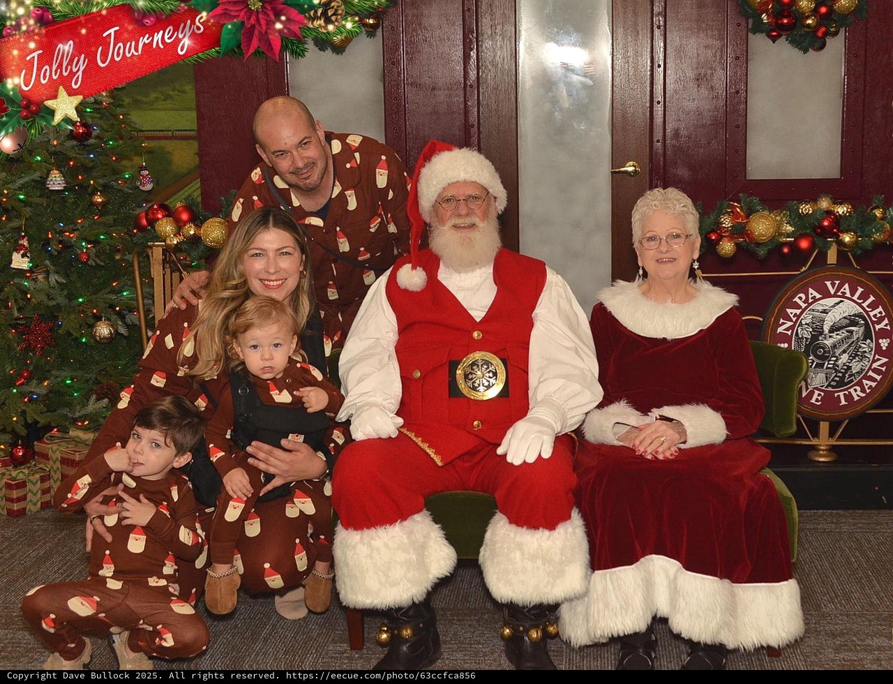 Family Christmas Portrait with Santa and Mrs. Claus