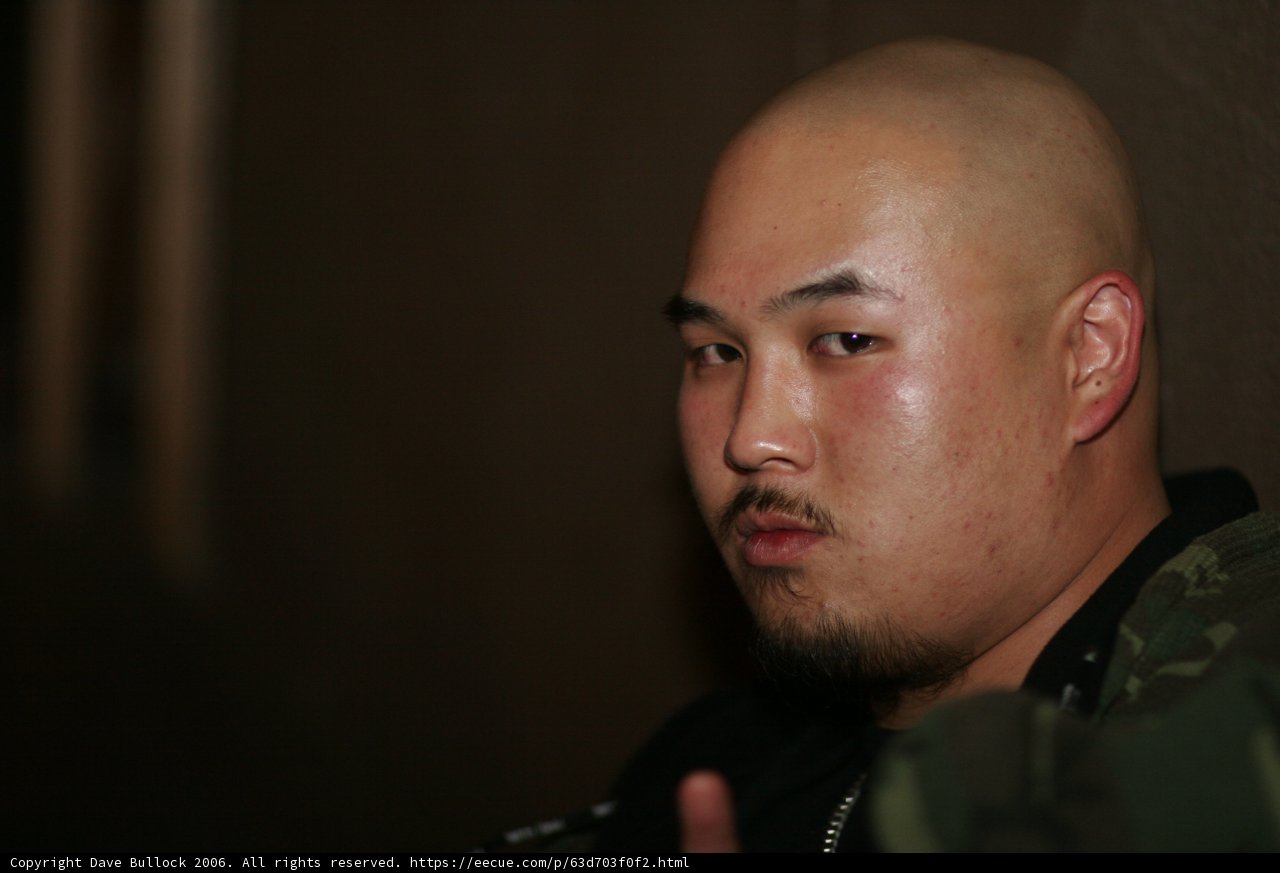 Shaved Headed Man in Black