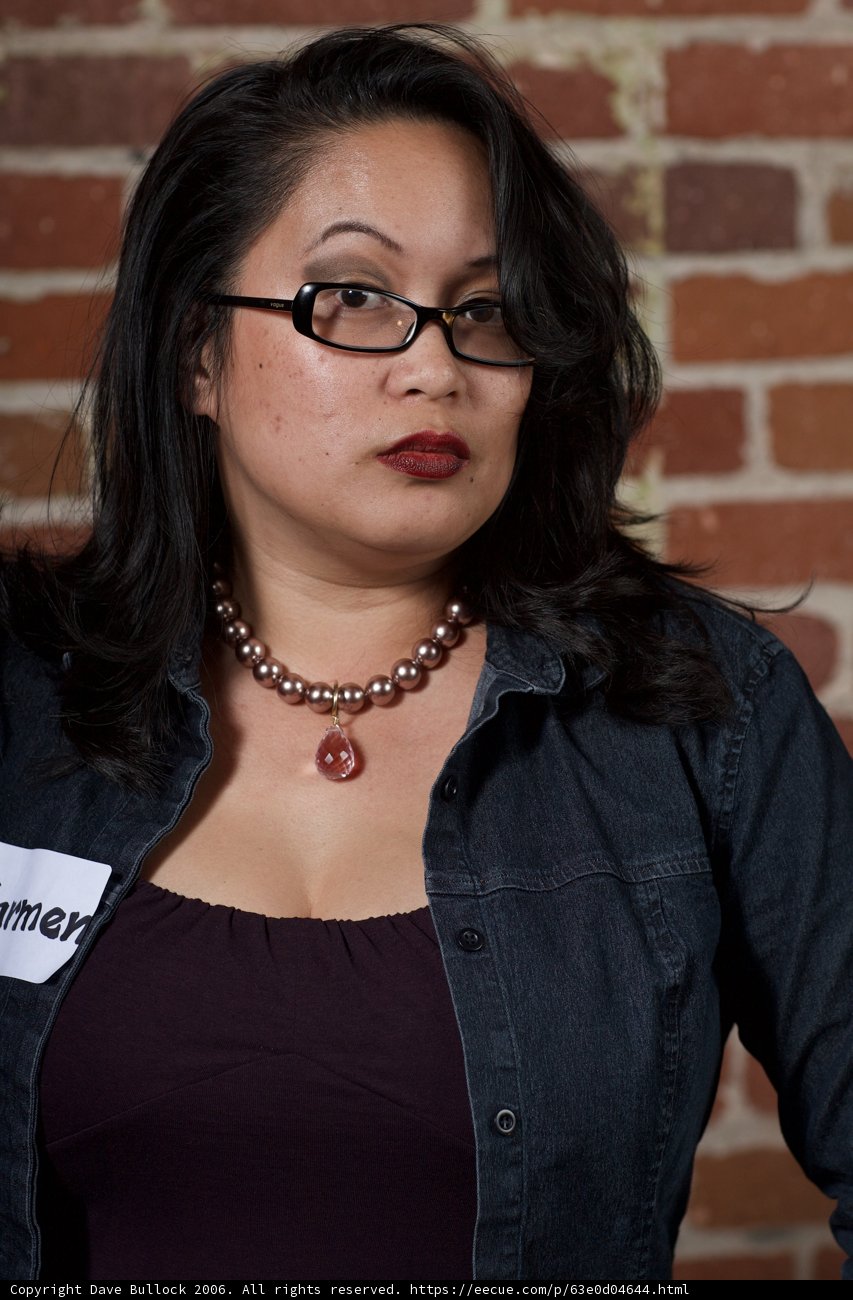 Stylish Woman with Glasses and Necklace