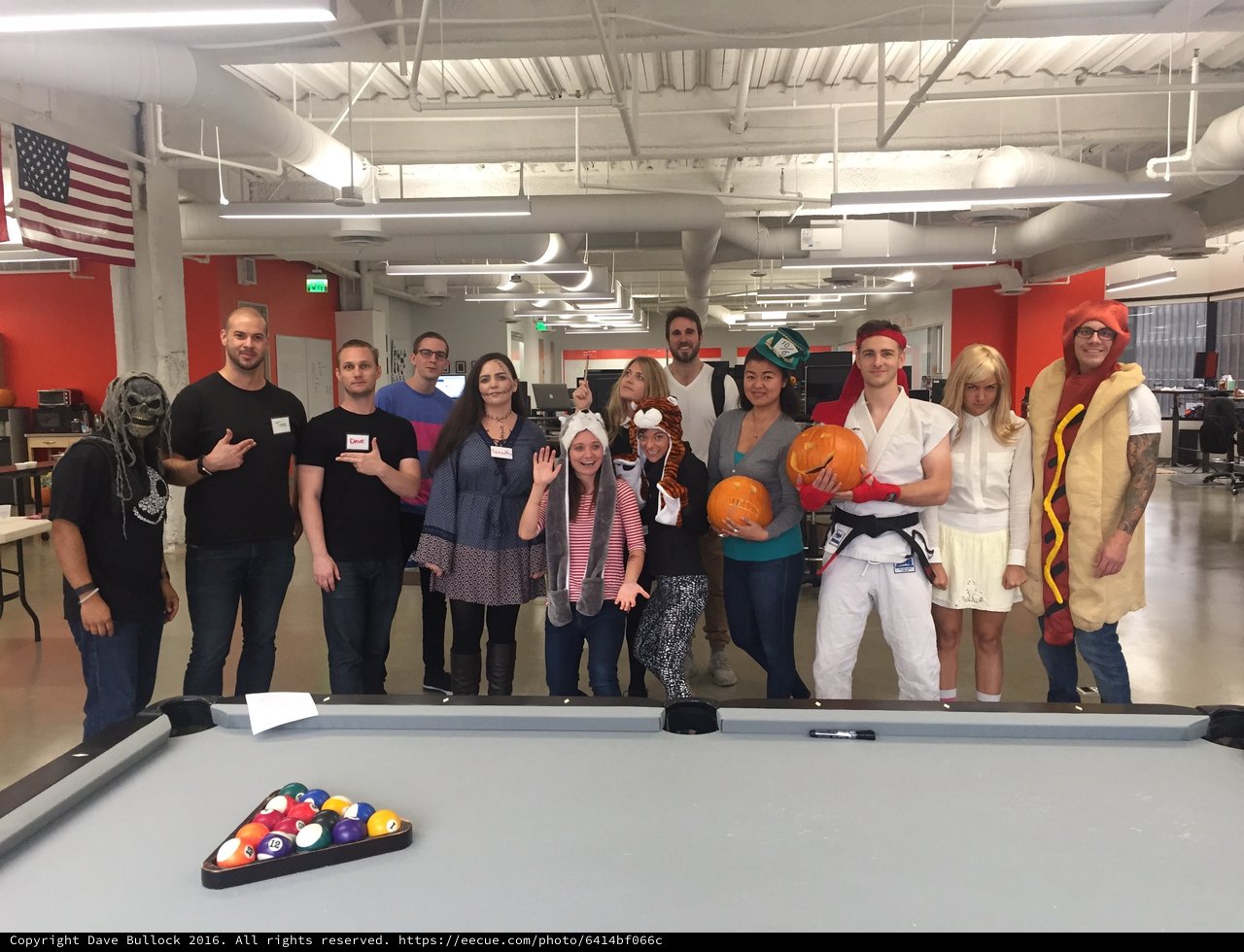 Office Halloween Costume Party Around Pool Table