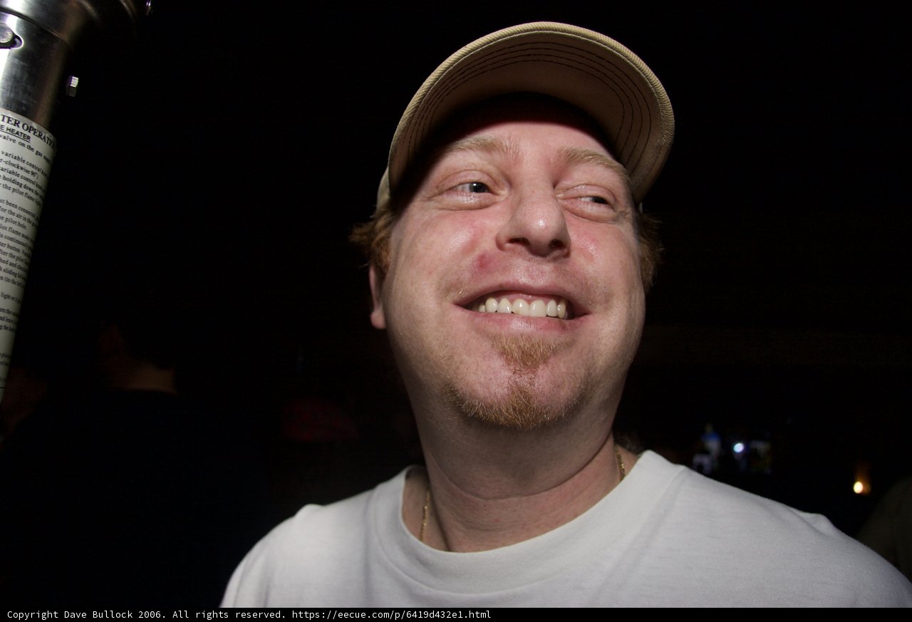 Smiling Randy J in White Cap