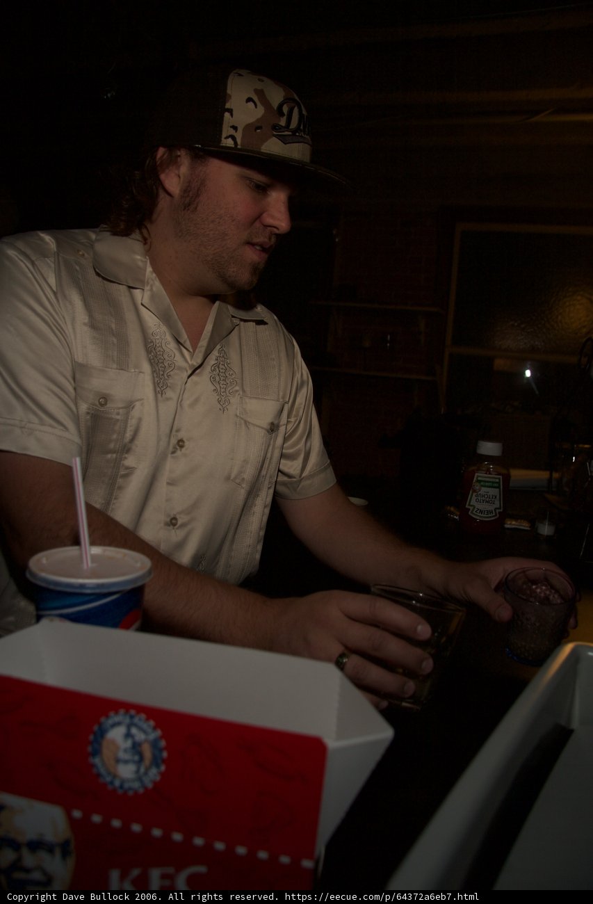 Colonel Sanders enjoying his drink