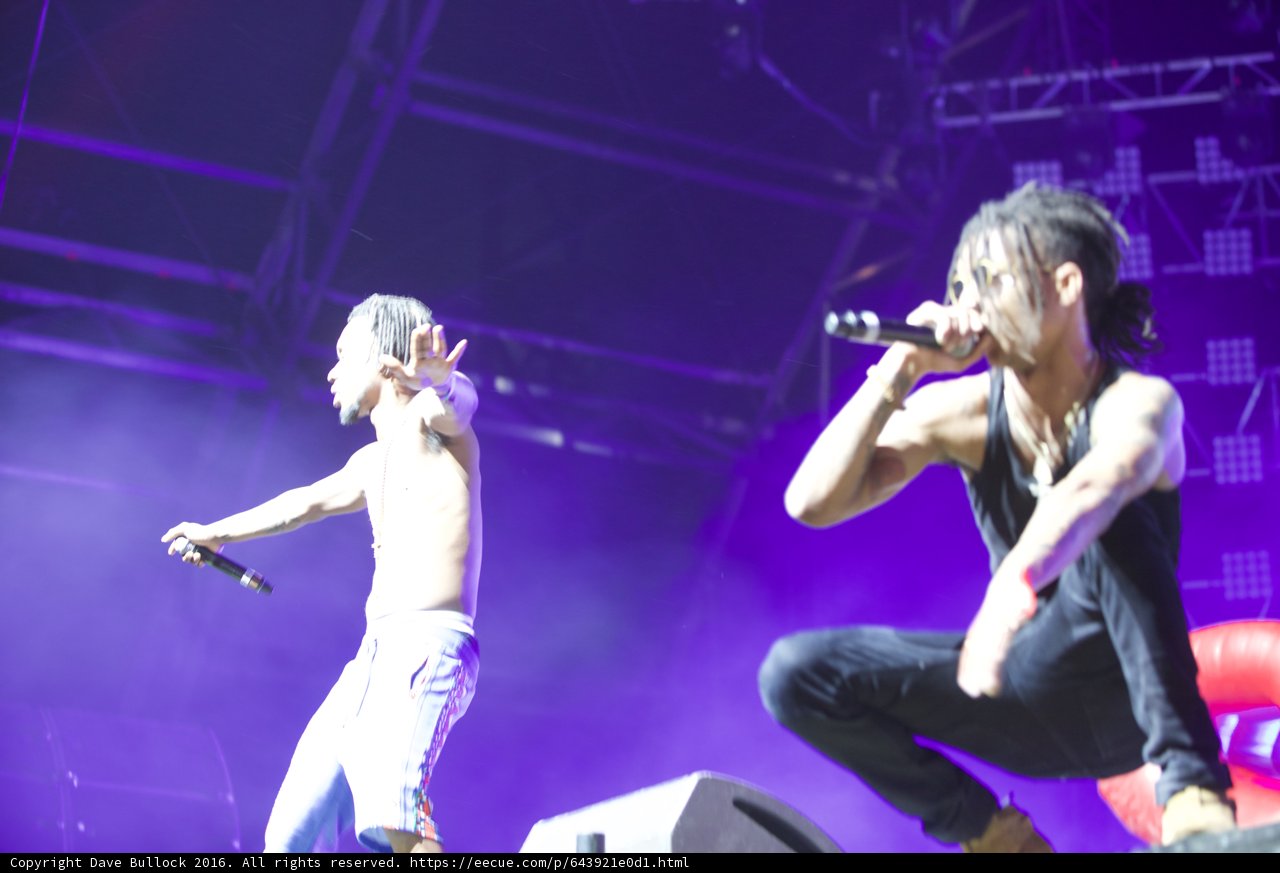 Rocking the Stage Caption: Two performers electrify the crowd with their musical talent at Coachella 2016 in Los Angeles, California.