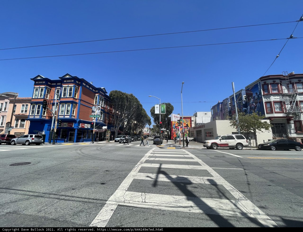 Busy City Street with Parked Cars