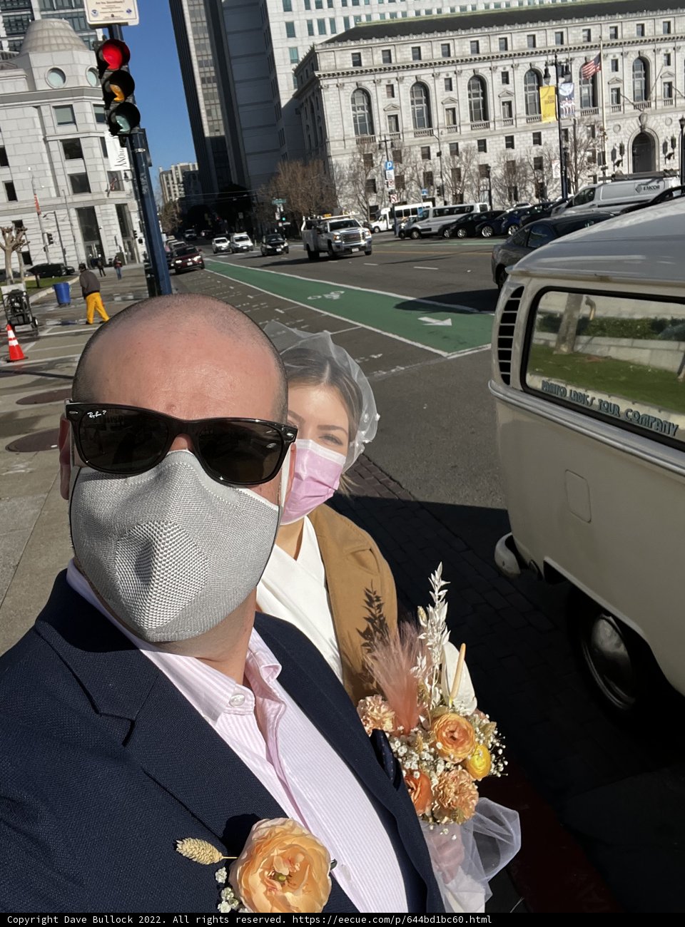 Man with Flower Bouquet and Sunglasses by the Van