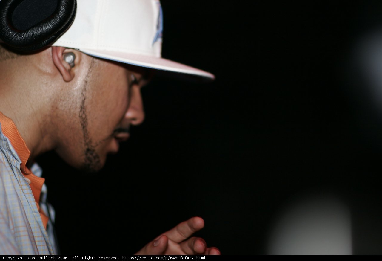 Man in Hat and Headphones