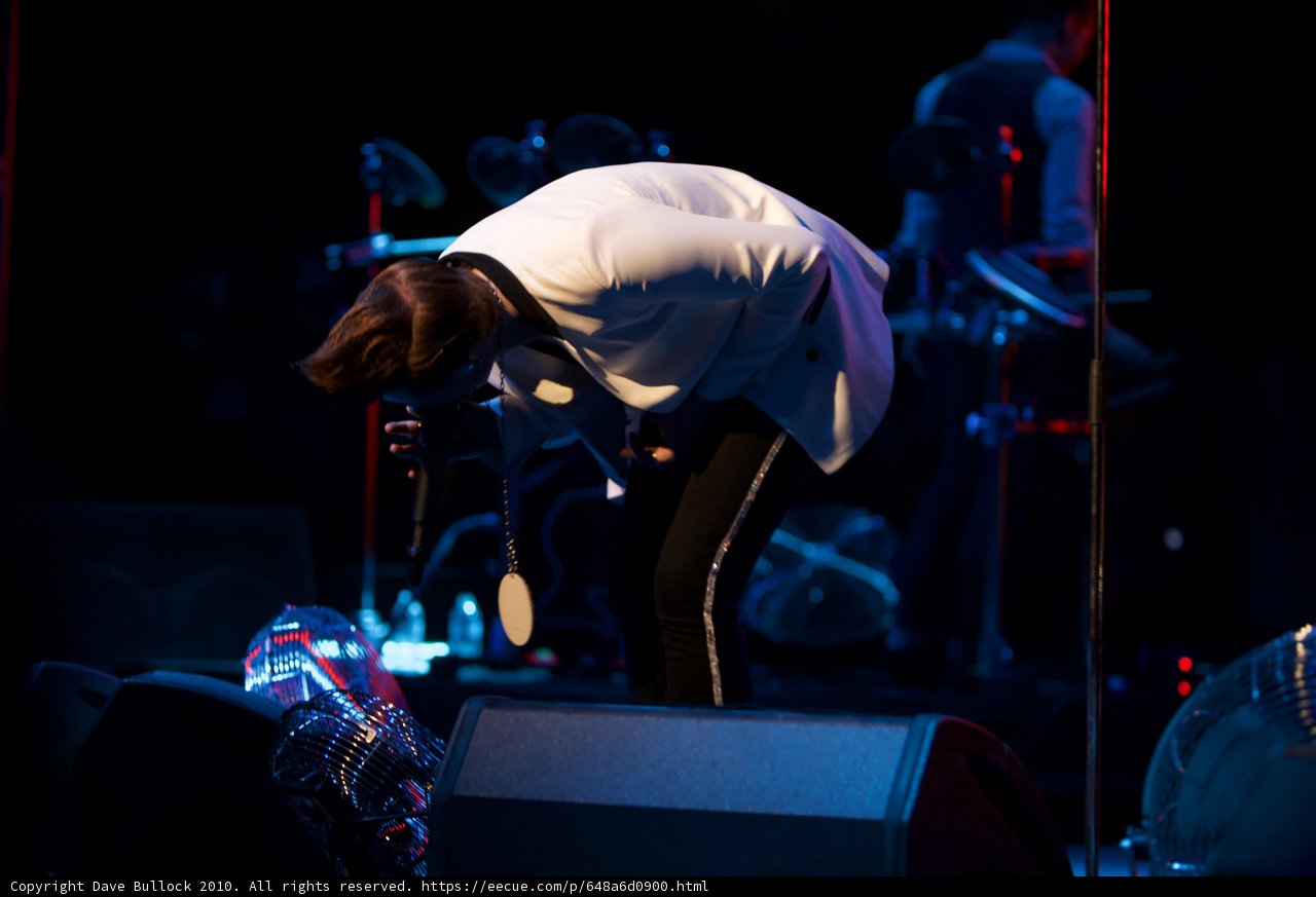 White Suit Man Rocks the Stage at Cochella