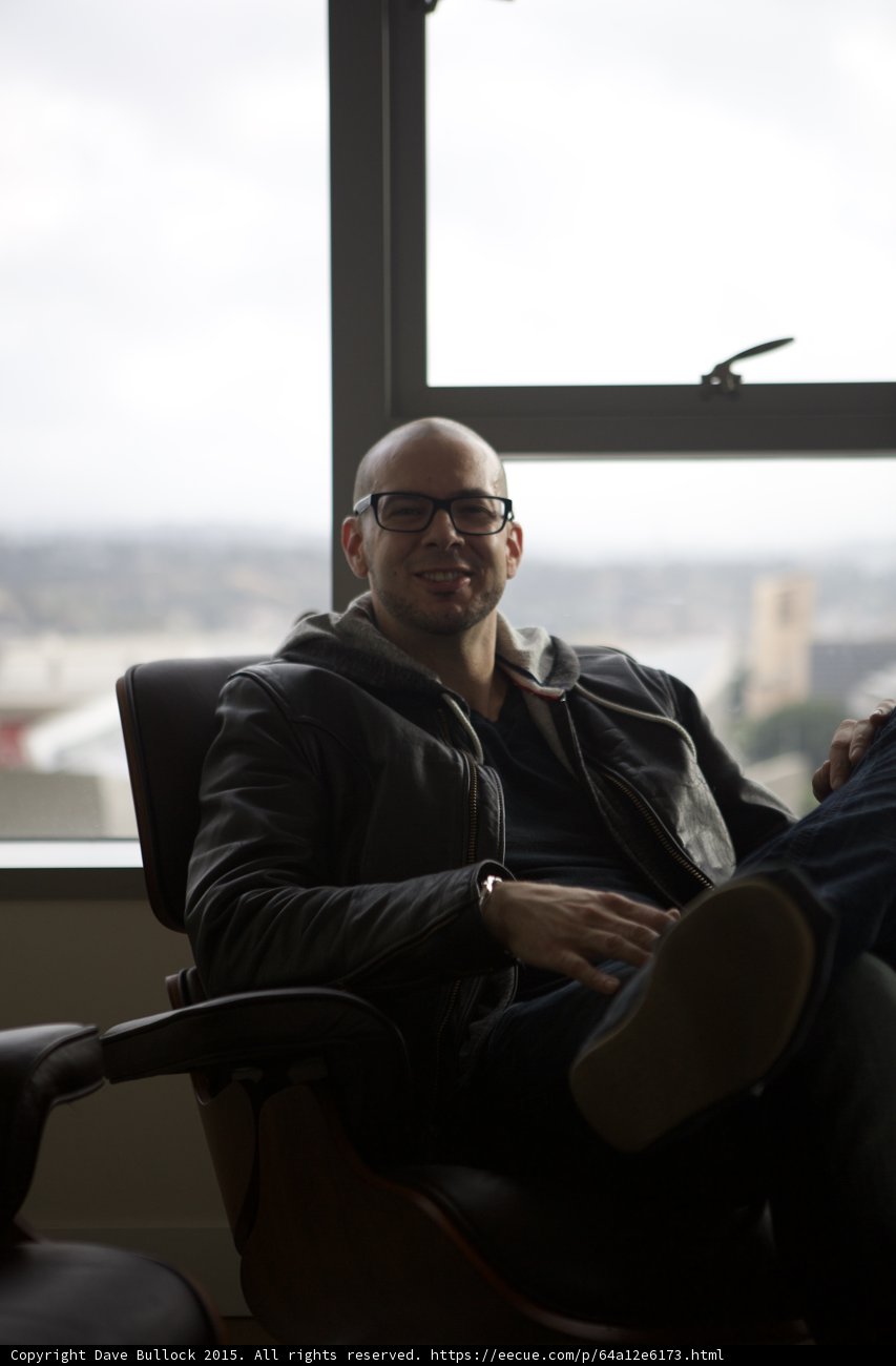 Smiling in the Eames Chair