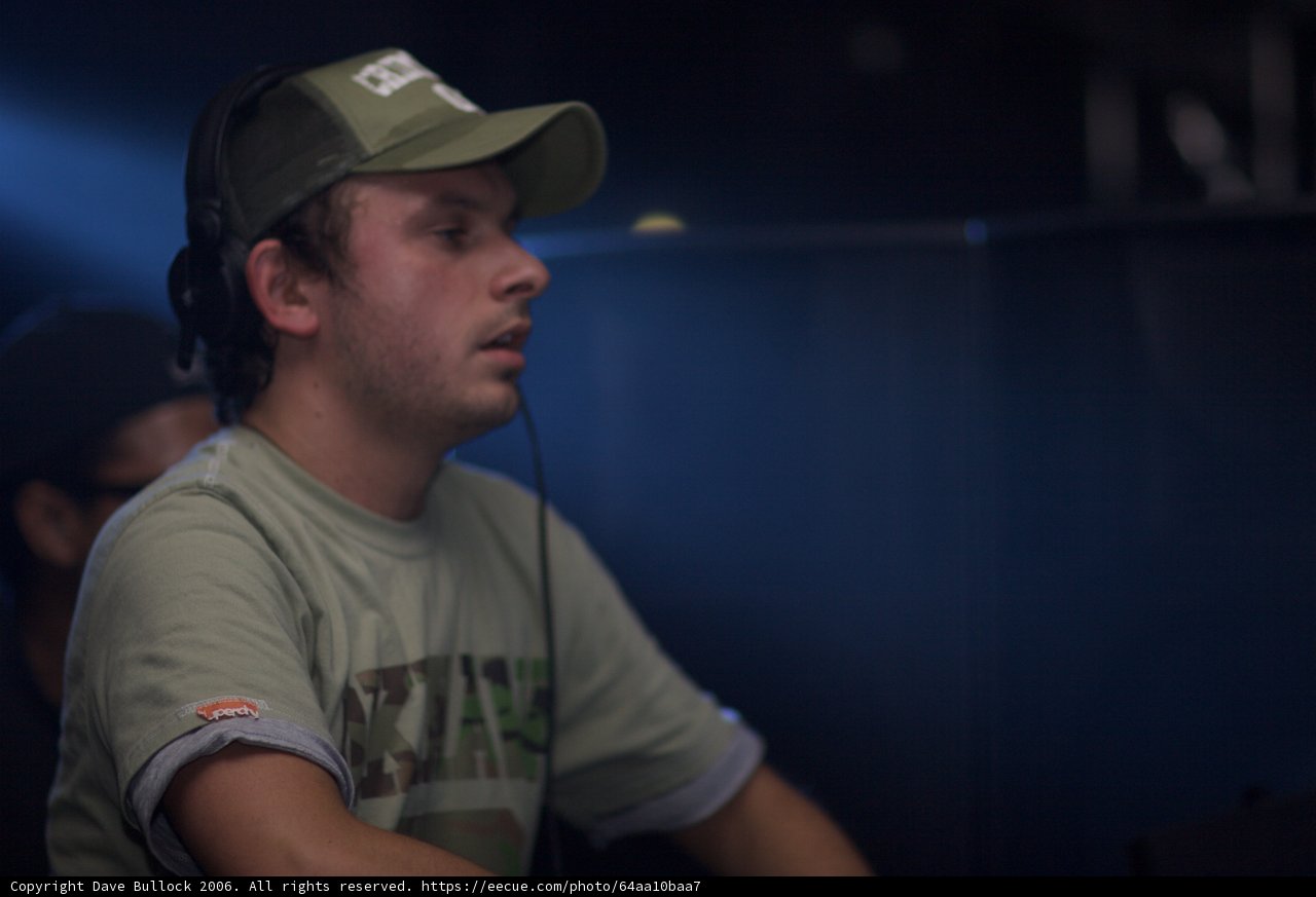 Green Shirt and Baseball Cap