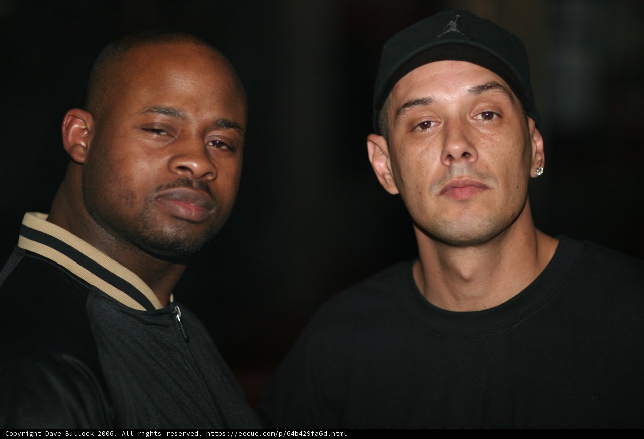 Two Men in Baseball Caps