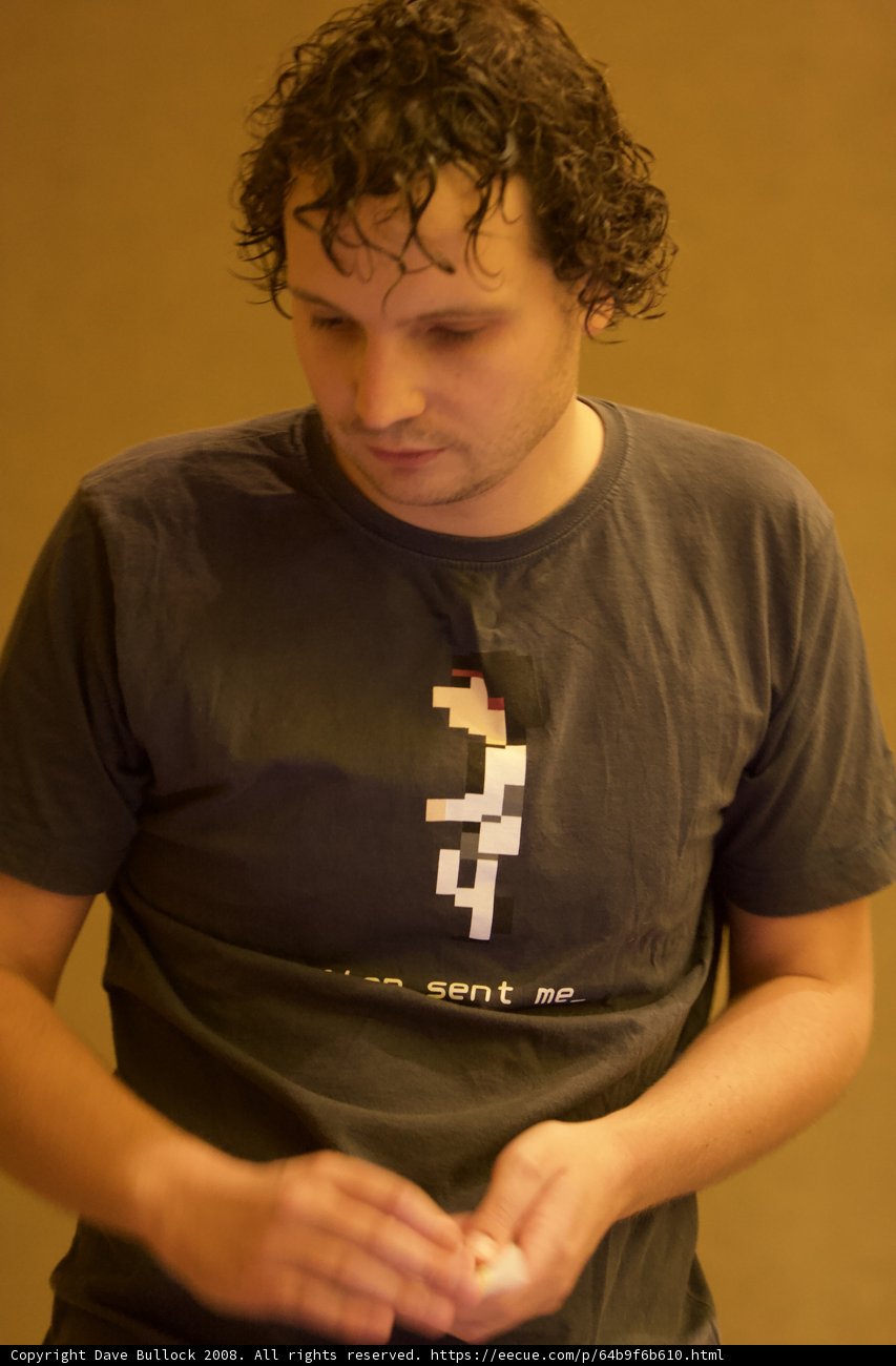 Black T-Shirt and Pointing Finger