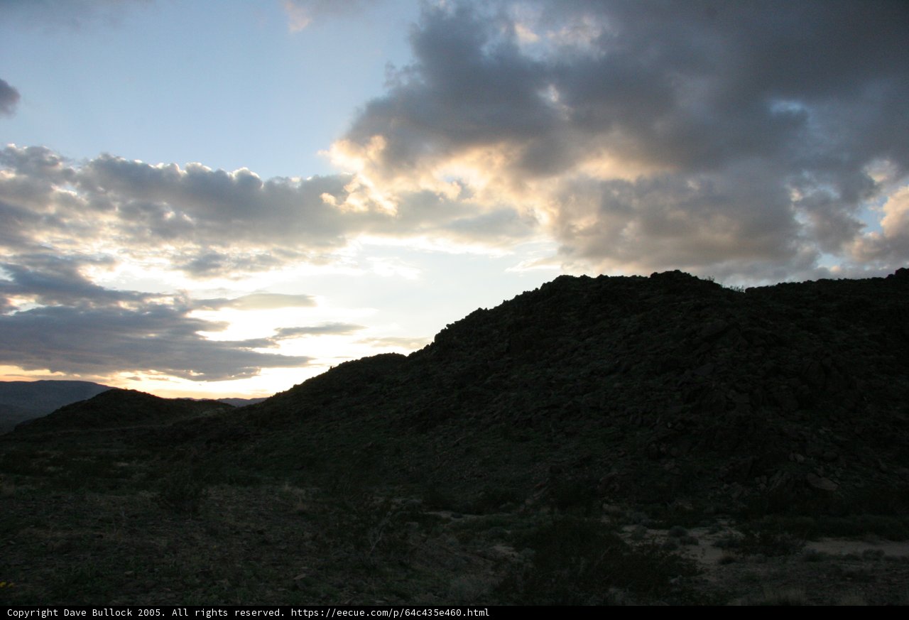 A Majestic Sunset Over the Rocky Hillside