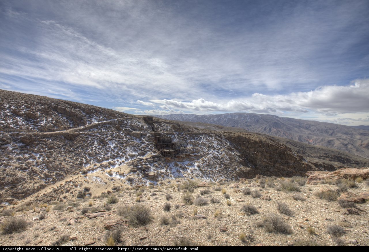 A View of the Majestic Mountains and Desert from a Hill