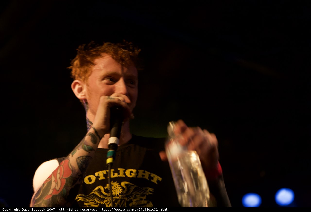 Tattooed Singer with the Mic