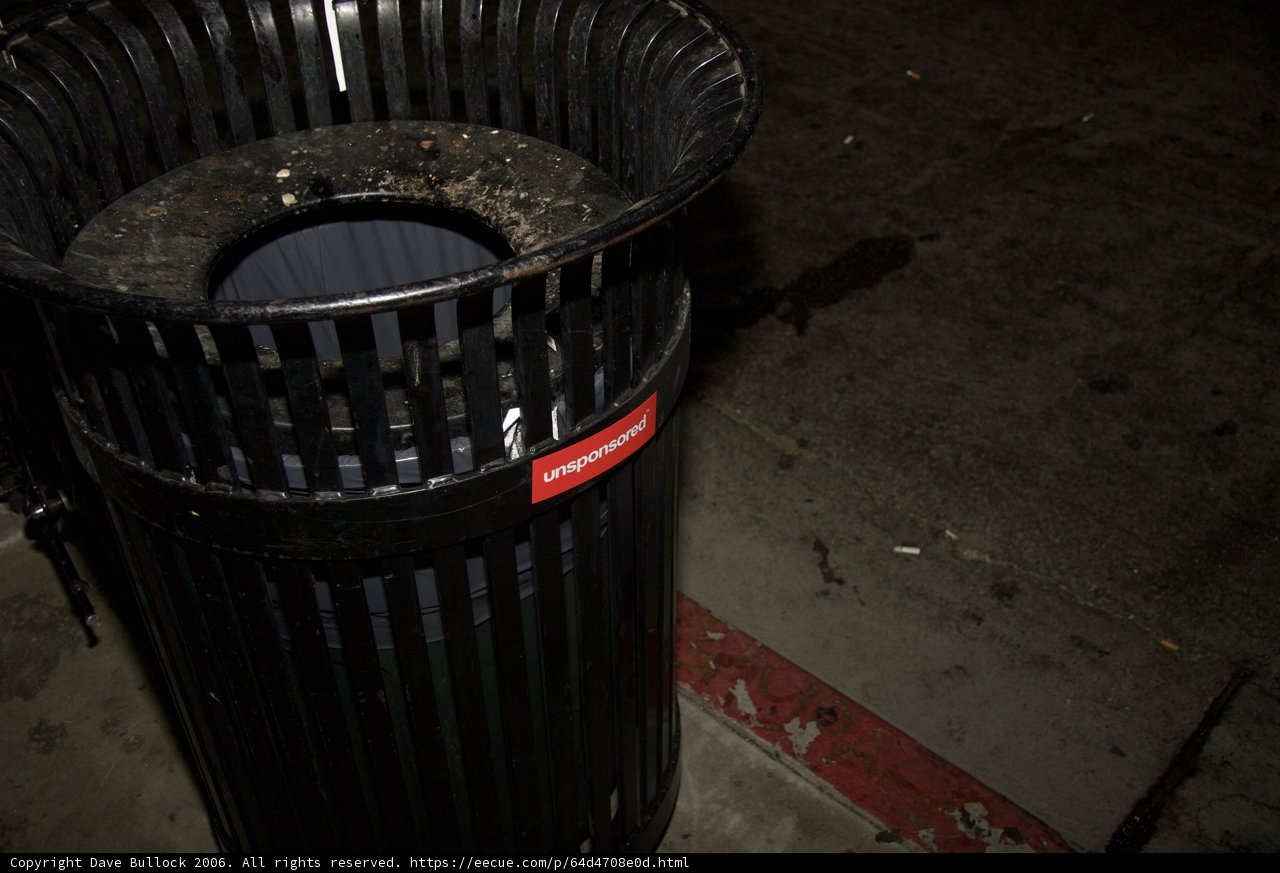 Red-Labeled Tin Trash Can