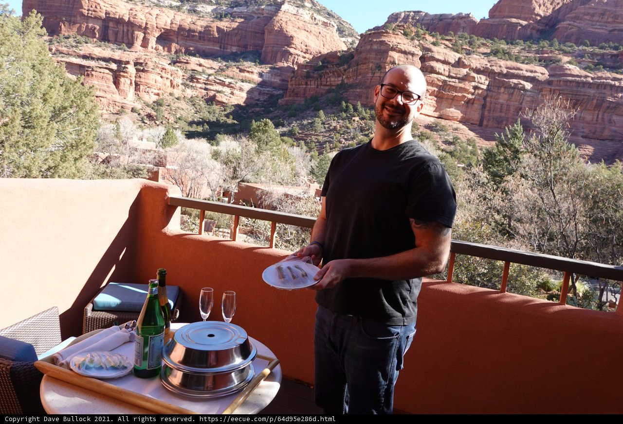 Man Enjoying a Scenic Outdoor Meal