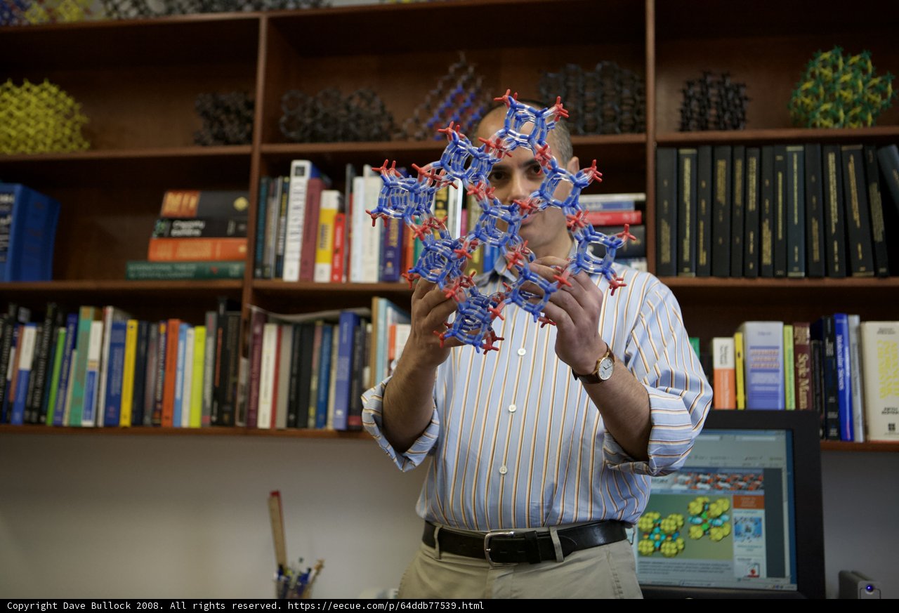 Man with Cube Model