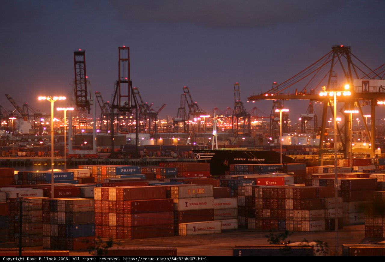 Dark Skies over Industrial Waterfront