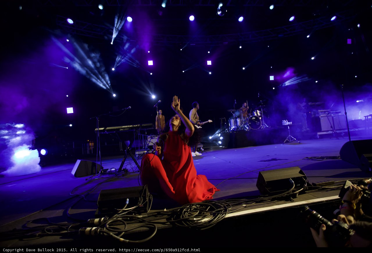 Solange Kneeling Hand Reaching Up Red Dress Purple