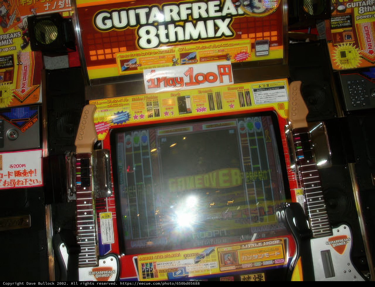 Jamming to Guitar Freaks 8 Mix at Osaka's Arcade