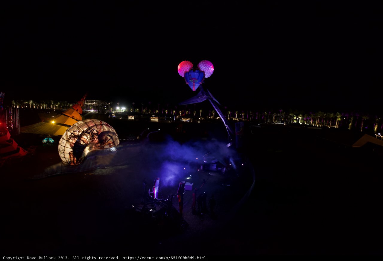 Illuminated Purple Balloon in the Urban Night Sky