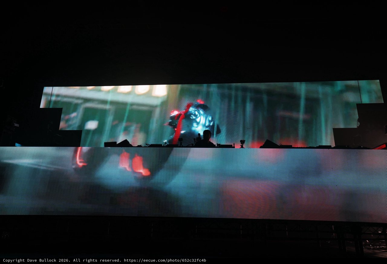 DJ Silhouette Framed by Massive LED Stage Visuals