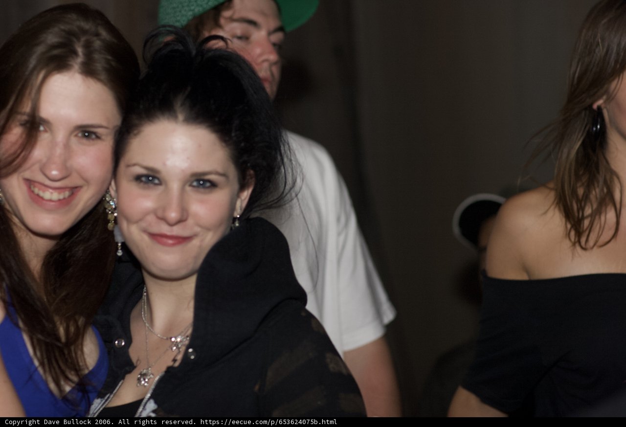 Formally Dressed Women Smiling for the Camera