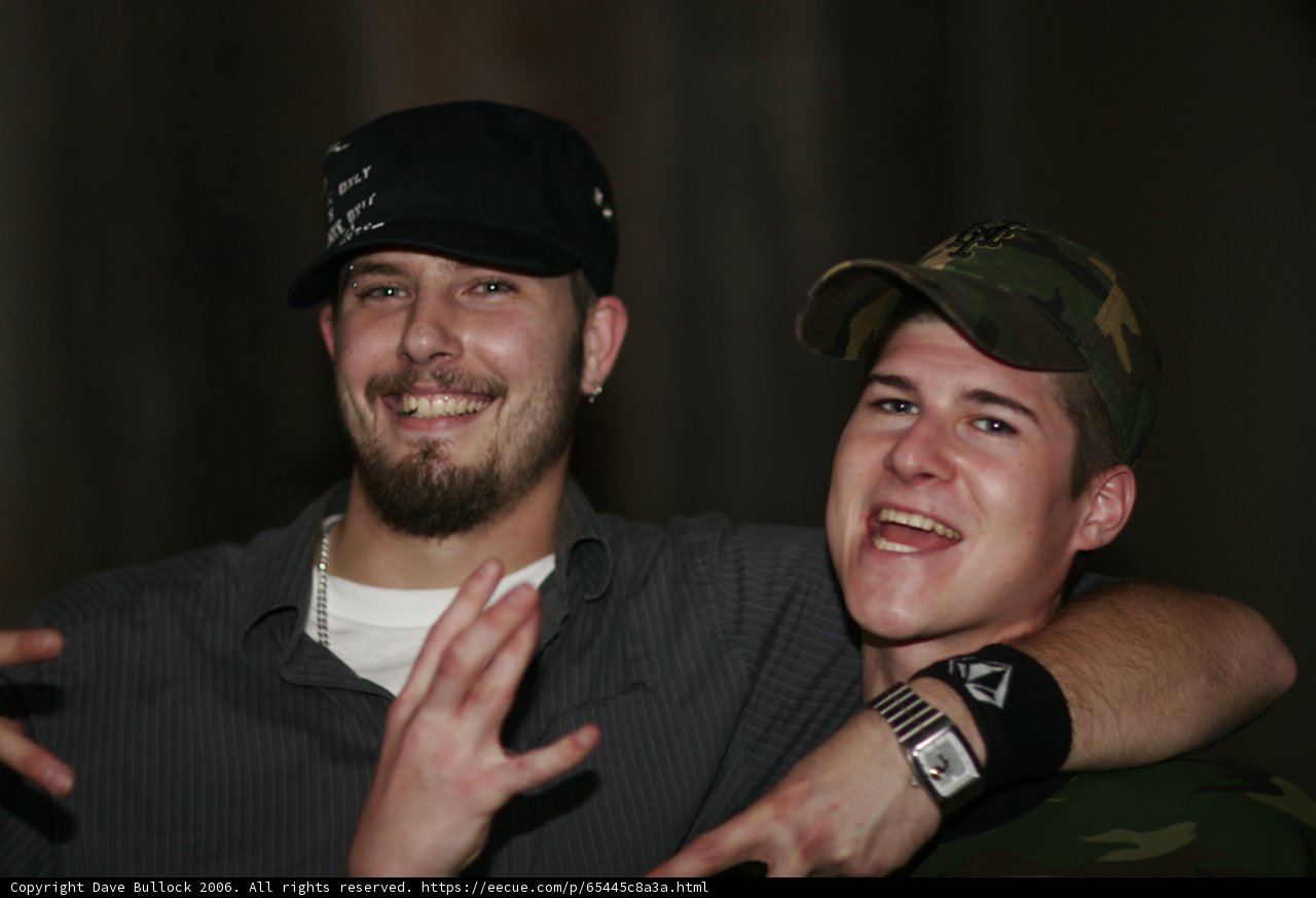 Two Men Strike a Pose