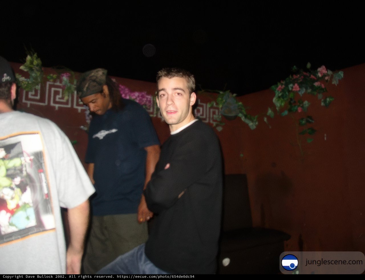 Three Men in a Dark Room