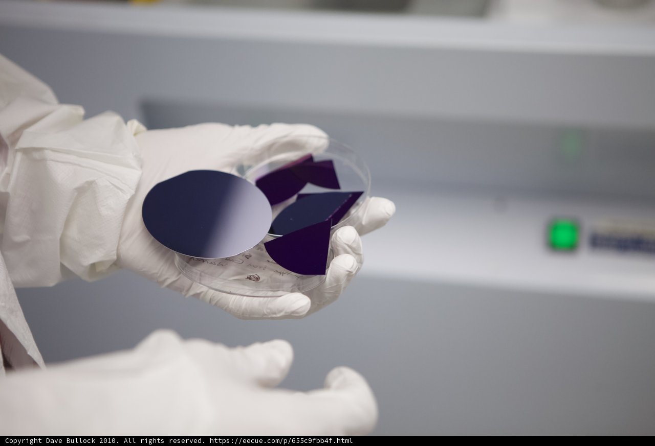 Examining a Piece of Purple Glass