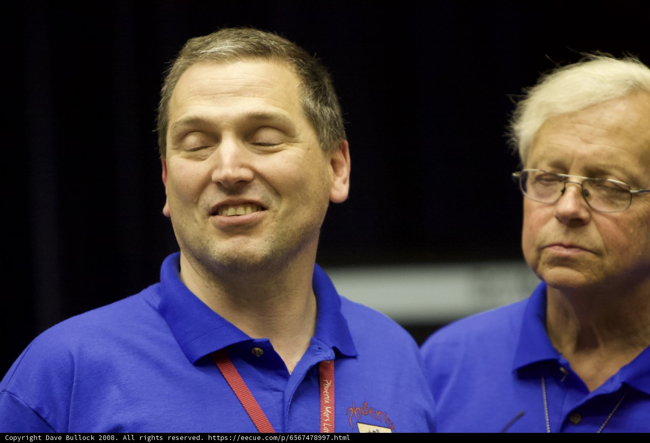 Two Men in Blue Shirts and a Red Tie