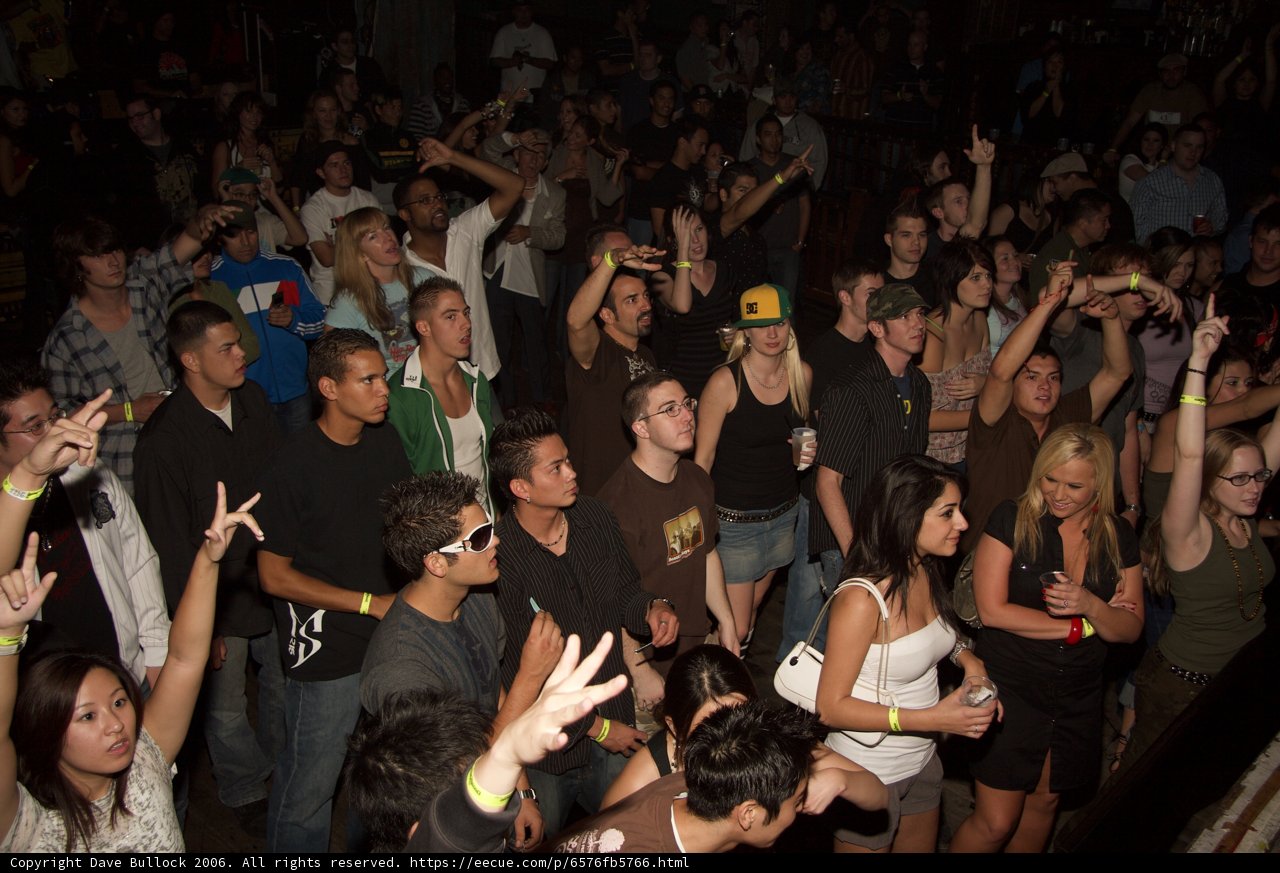 Urban Nightclub Crowd Goes Wild at Concert