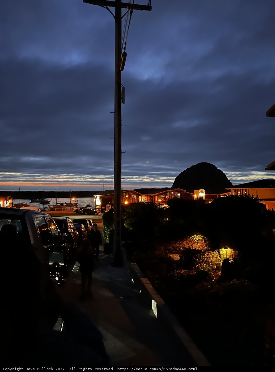Urban Nightscape with Lamppost and Vehicle
