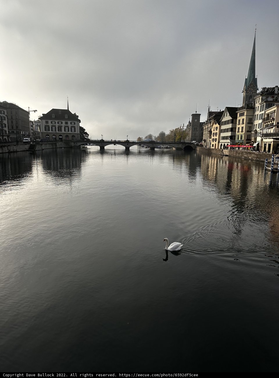 Cityscape of Zürich: Bridge and Church on a Waterfront