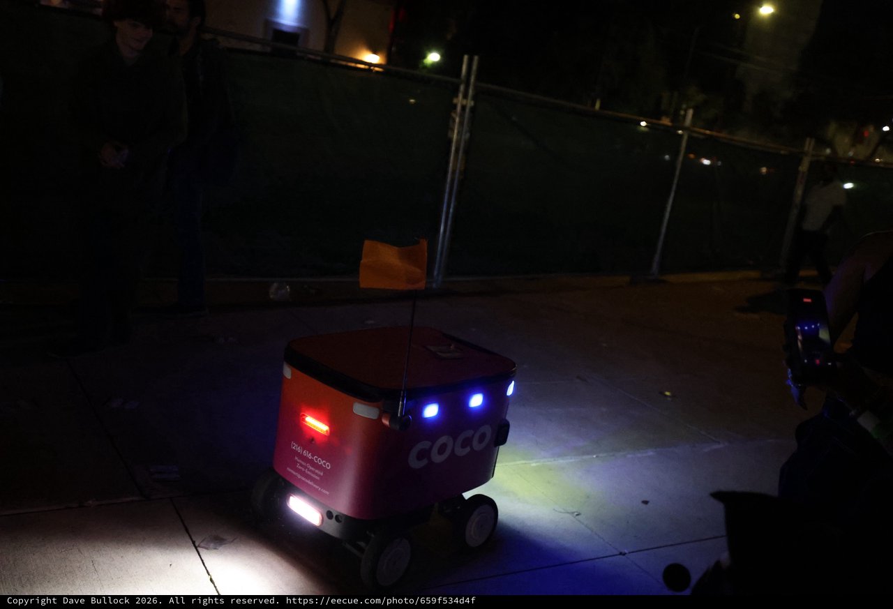 Coco Delivery Robot Navigates Urban Sidewalk at Night