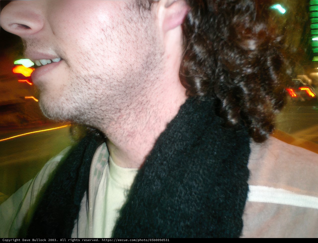 Curly Haired Man with a Stole