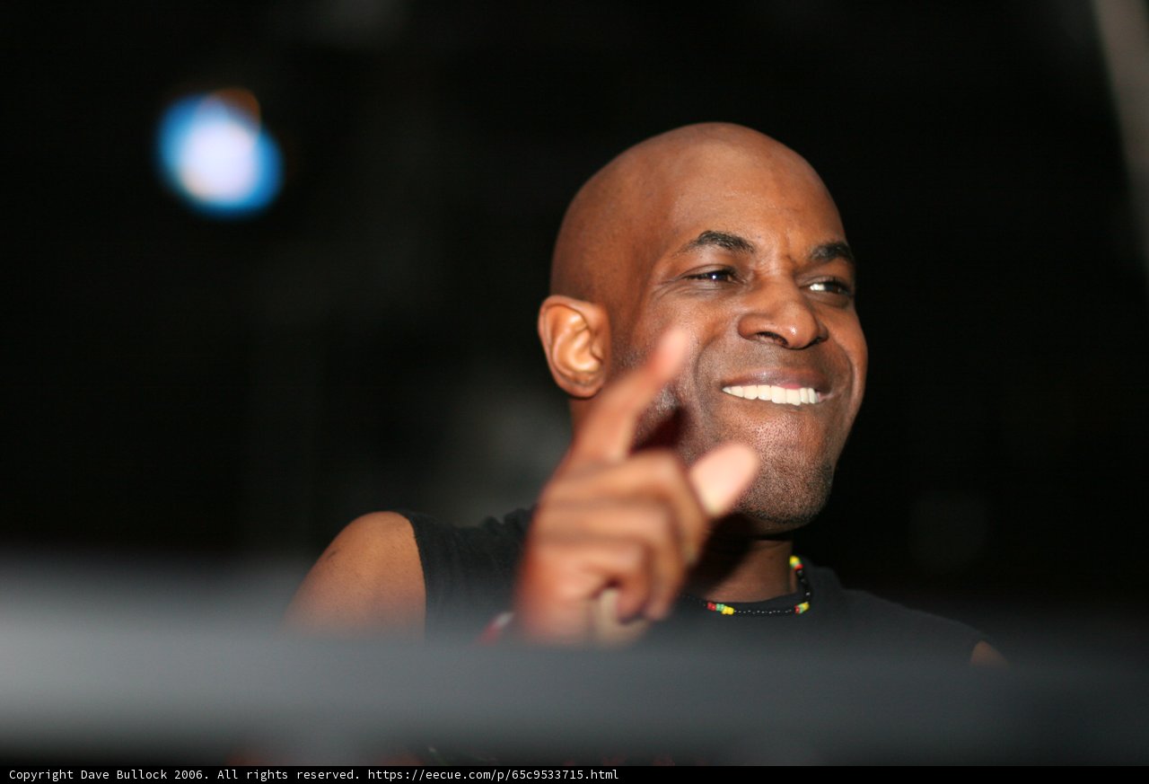 Mic in Hand, Smile on Face
