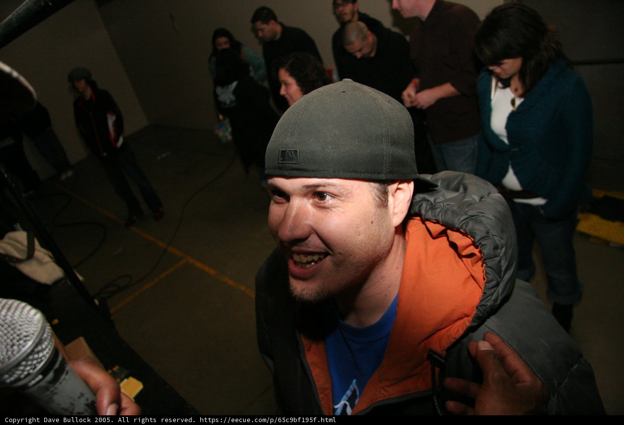Gray Jacket and Baseball Cap