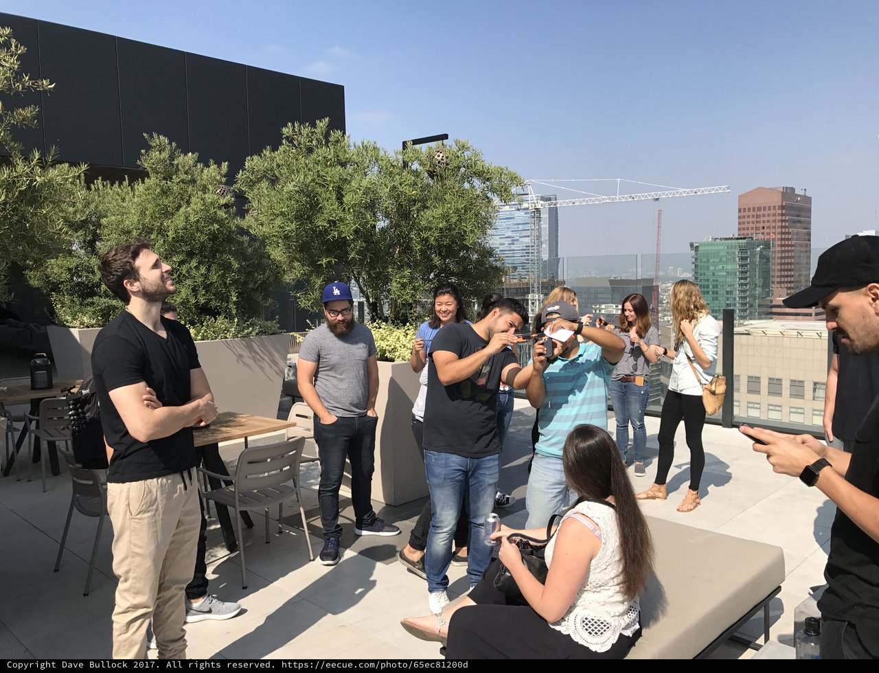 Rooftop Gathering During Solar Eclipse Viewing