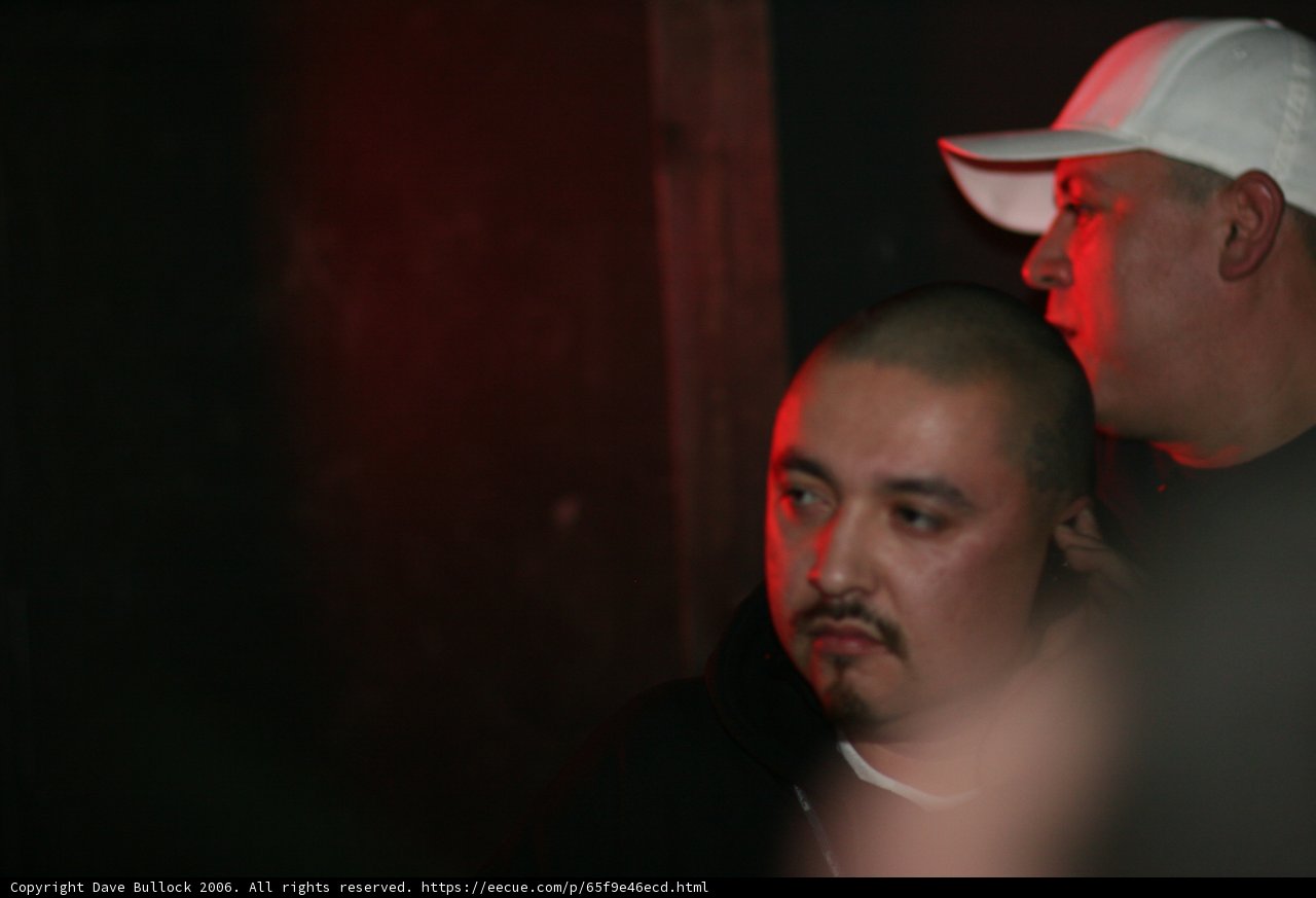 Two Men in Baseball Caps