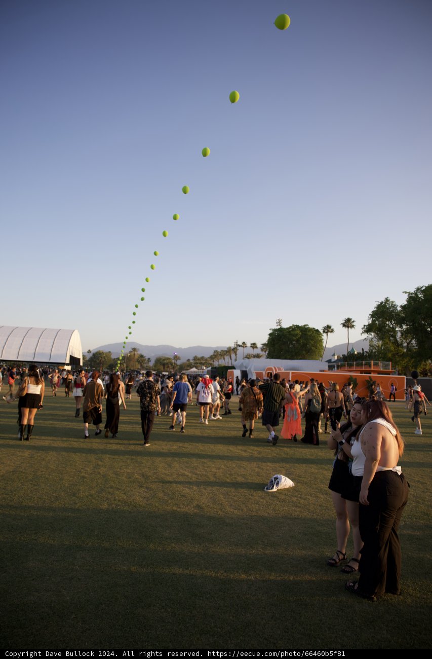 Sunset Soirée: A Cheerful Moment at Coachella 2024, Week 2