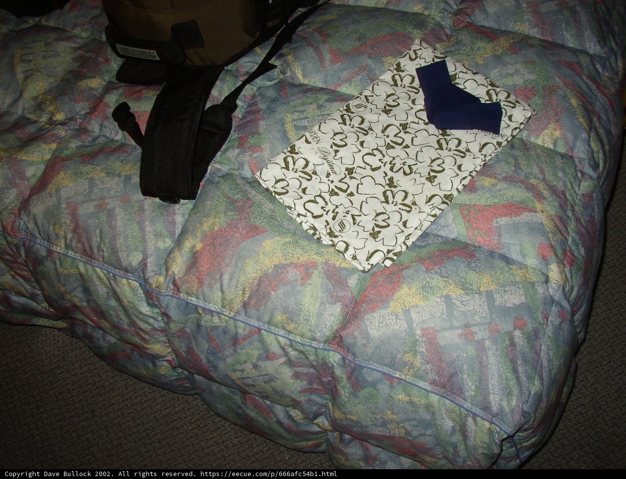 Cozy Bed with Quilt and Bag in Hotel Sungarden Dojima