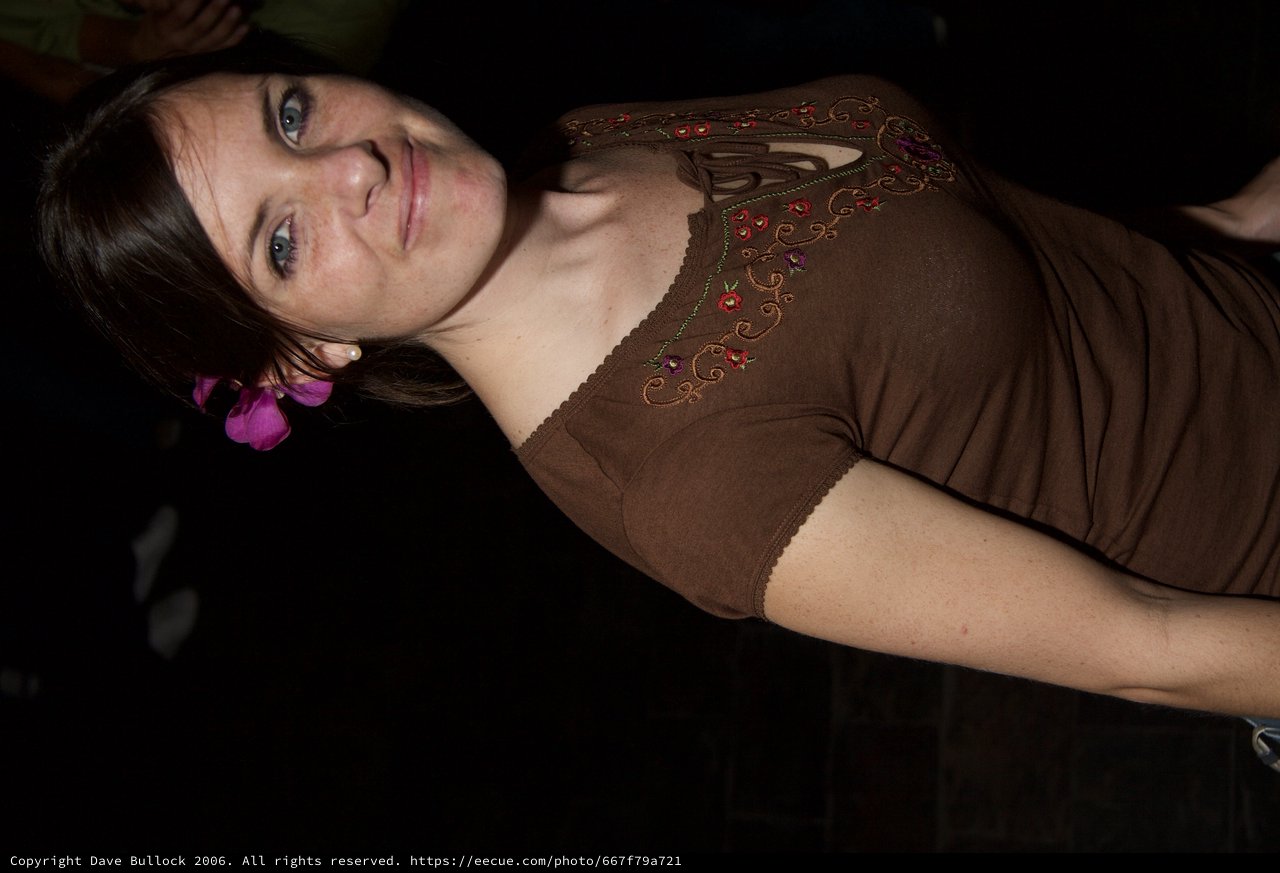 Smiling Woman with Pink Flower at Art Walk