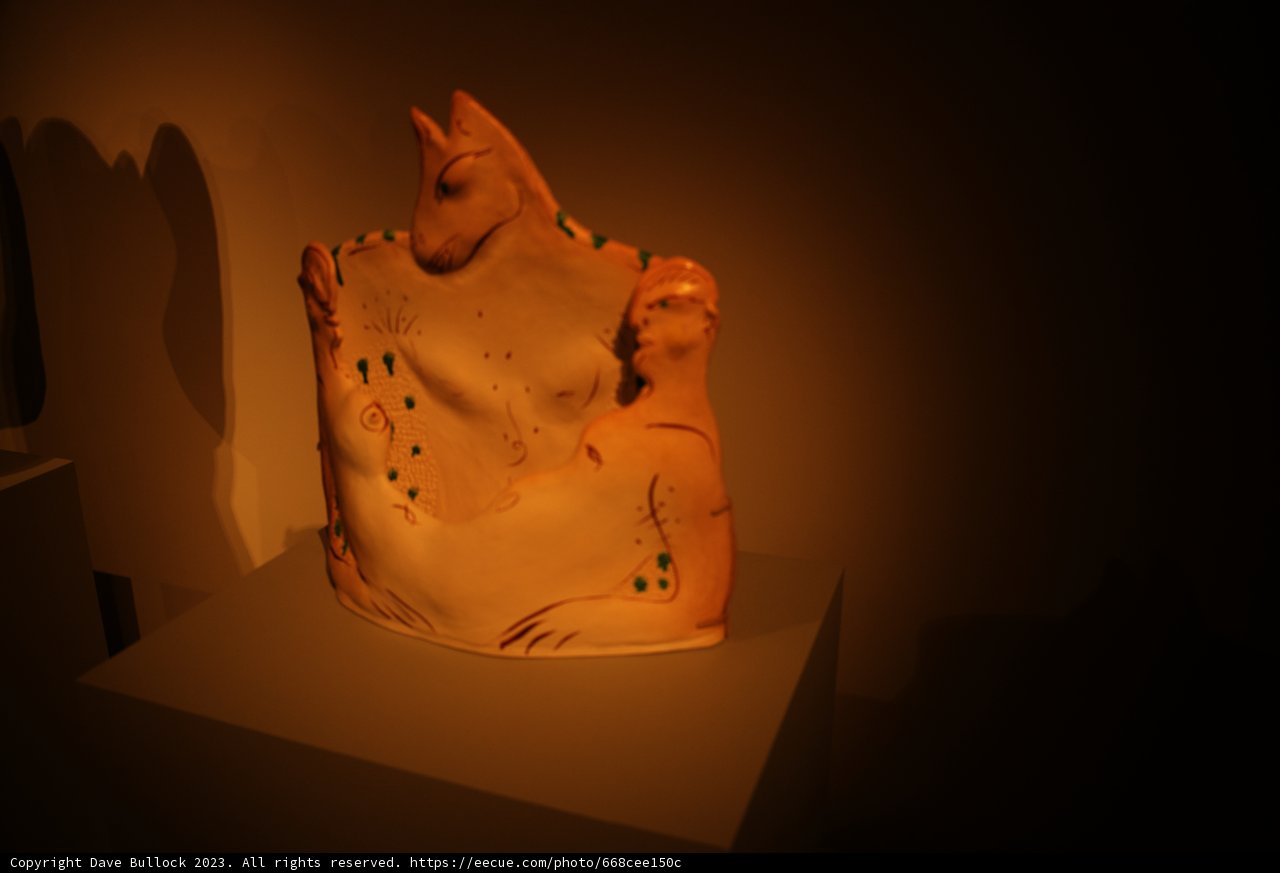 Canine-inspired Craftsmanship: White Dog Vase
