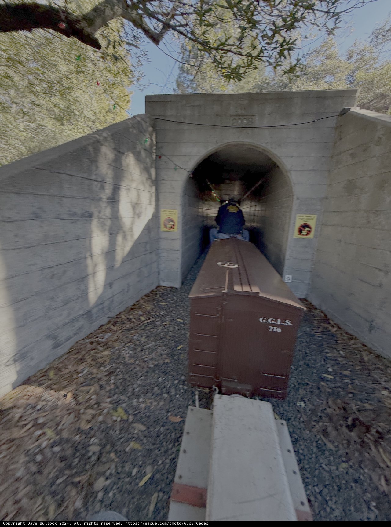 Historic Railway Tunnel with Train Cars
