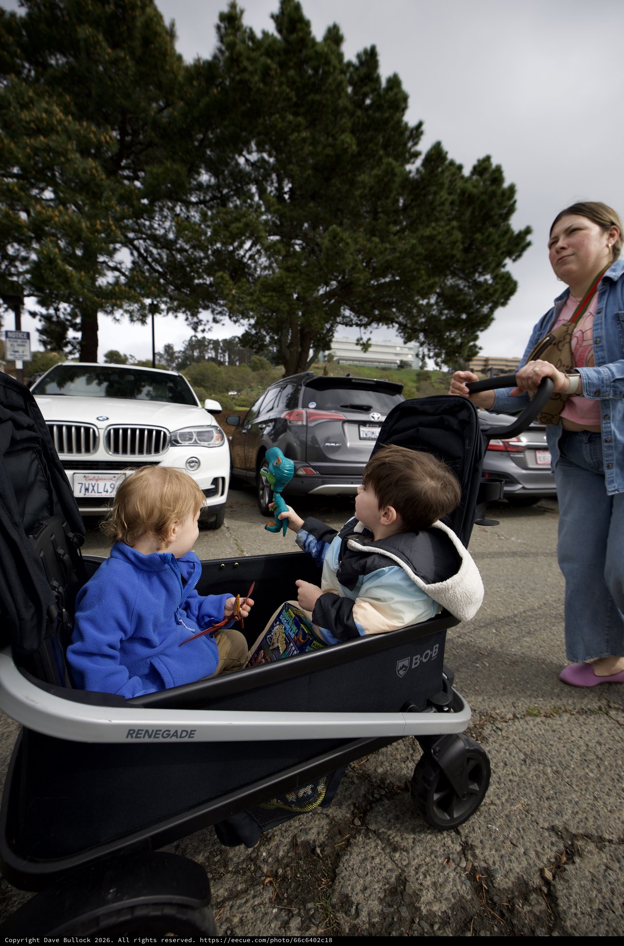 Family Outing with Kids in Wagon at Parking Lot